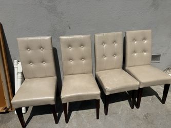 4 Leather Chairs From Pier 1 - Two Of Them Have Visible Wear