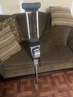 Equate crutch with Fanny pack cup holder