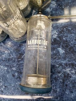 Barbicide disinfectant jar