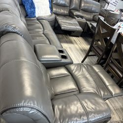 Spring Blowout Sale. Madrid Gray Leather Reclining Sectional Only $1399. Easy Finance Option. Same-Day Delivery.