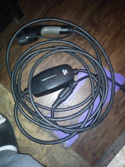 Evo Evdance level 1/2 portable electric vehicle charger.Its all black.