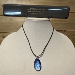 Brand new handmade Sapphire Swarovski pendant necklace with silver hardware.