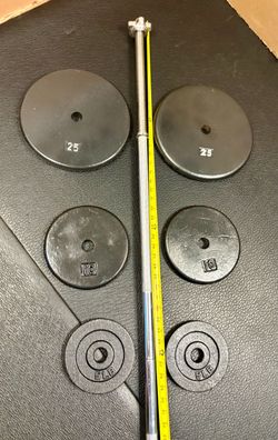 Standard 6 ft Gently Used Bar ( Split in 2 pieces) with pair of Cast Iron Plates of 25#, 10# and 5 pounders. Brute Weight: 100 #