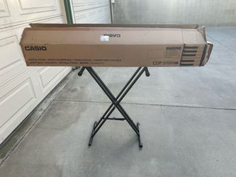 Casio electronic keyboard and stand