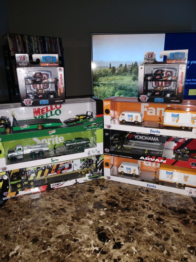 M2 Auto Haulers chases and a raw and 2 Auto Zone Special Editions for sale or trade Brand New Never Opened
