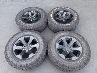 (4) 18” Dodge Ram Wheels Black 275/70R18 Goodyear Wrangler