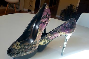 Carlos Santana heels