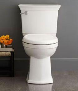 American Standard Optum VorMax Two-Piece 1.28 GPF Single Flush Elongated Chair Height Toilet with Slow-Close Seat in White
