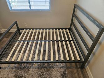 Queen size bed - pewter color.  Steel