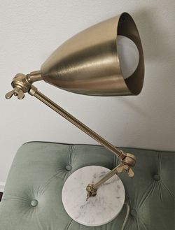 Gold, aluminum and brass adjustable table lamp