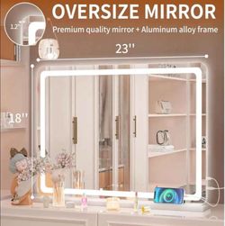Mirror built in lights and ports located in Mesa Main Street and Gilbert rd