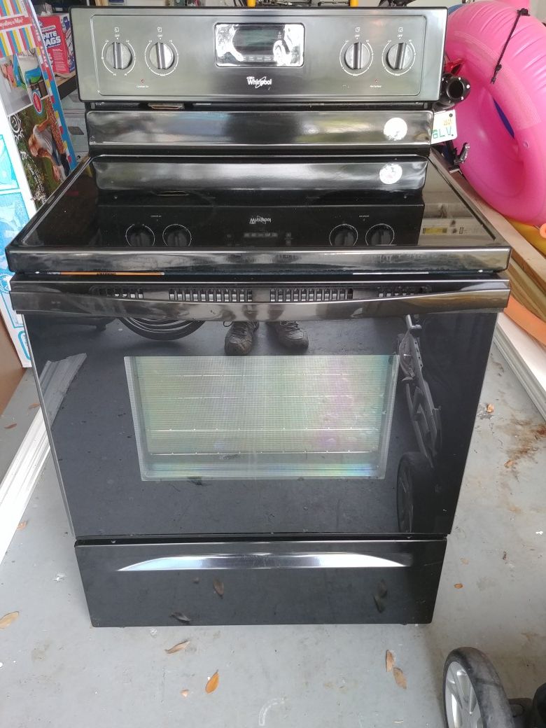 Whirlpool black range dishwasher and microwave appliance set