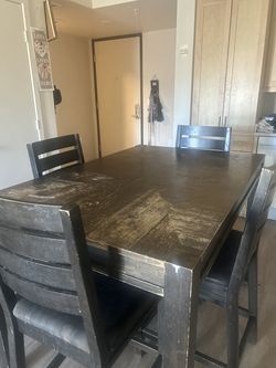 Wooden table (extends) seats six