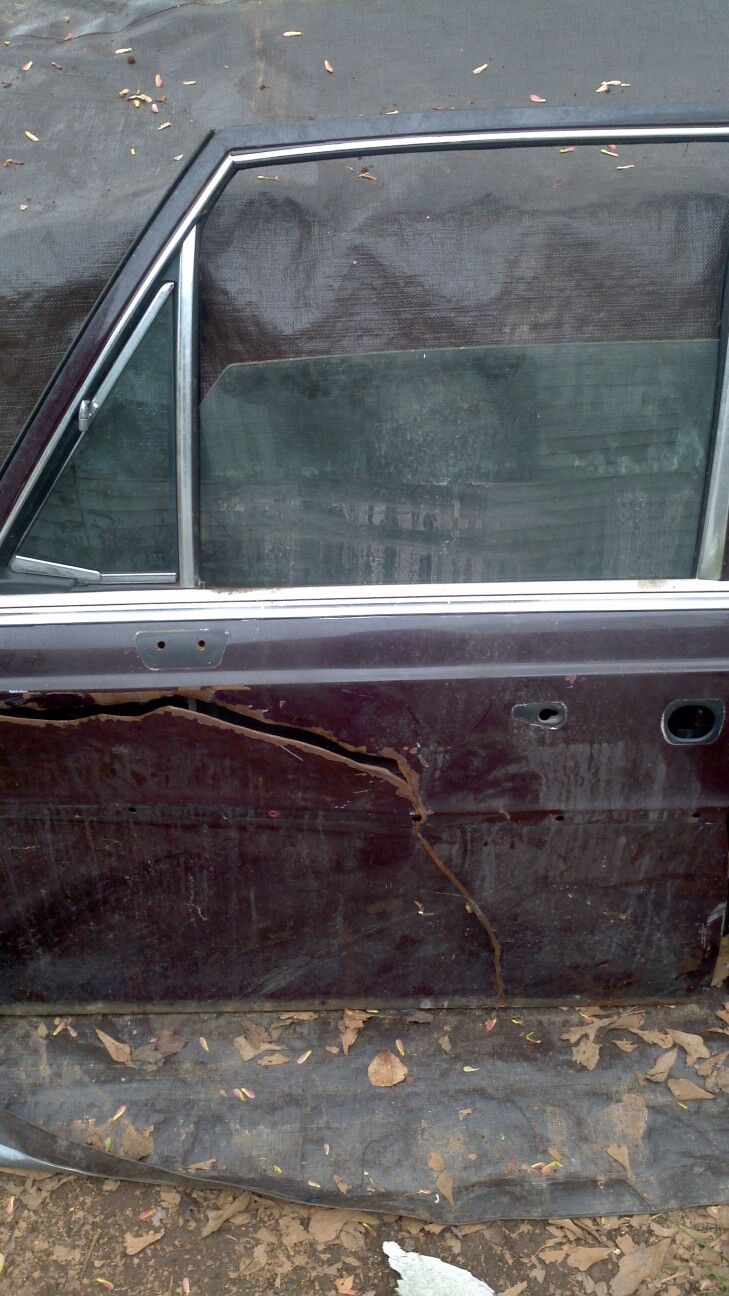 Vintage Mercedes drivers side door glass