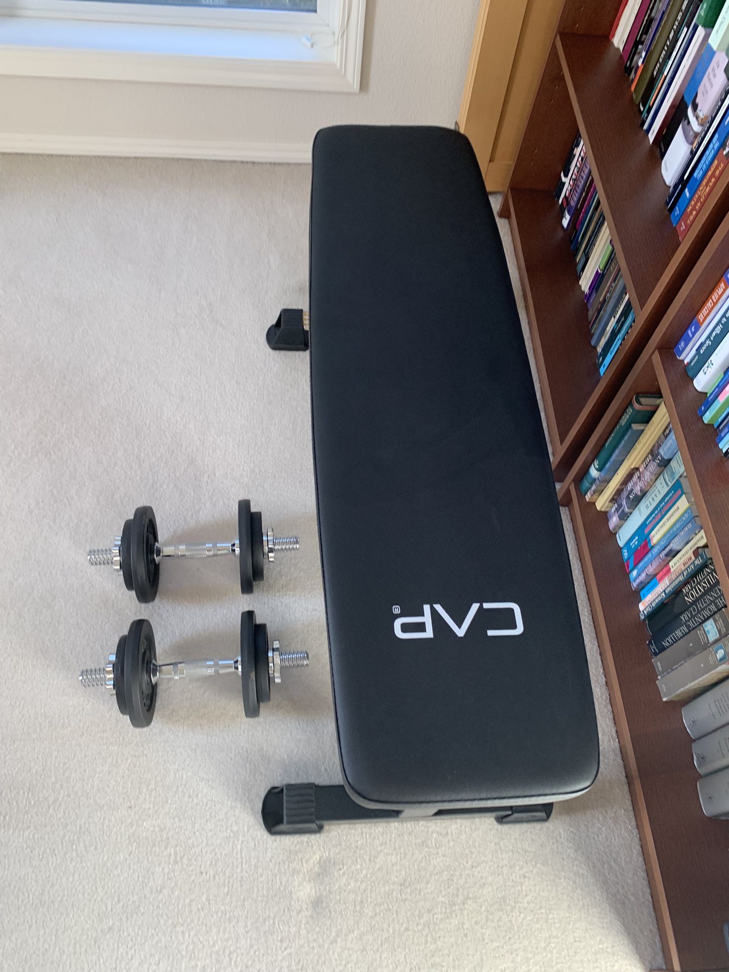 Weight Bench And Two Dumbbells
