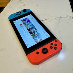 Nintendo Switch + Games + Case