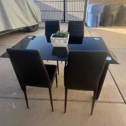 Glass Dining Table And 4 Chairs 