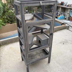 Small to medium sized animal enclosure 4.ft high 2 feet across