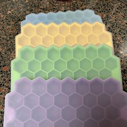 4 MINI ICE CUBE TRAYS  $12.00