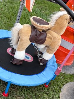 Riding plush horse