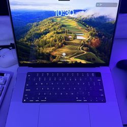 Apple MacBook Pro (16 inch, M1 Pro chip with 10‑core CPU and 16-core GPU, 16GB RAM, 512GB SSD)
