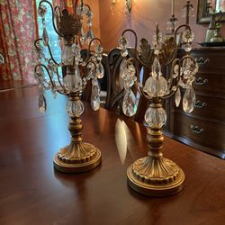 Glass and Gold Tone Candleholders in Excellent Condition One is 13”h the other 15”h. Smoke and pet free household.