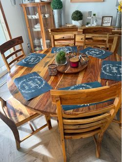 Heavy wood dining room table with Chairs