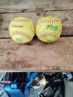 USED 12 IN SLOW PITCH SOFTBALLS