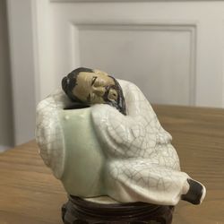 Shiwan Mudman  Crackle Glazed Figurine  of  Man Sleeping on Vase  ~ Vintage~   The information provided is offered as to the best of our knowledge and