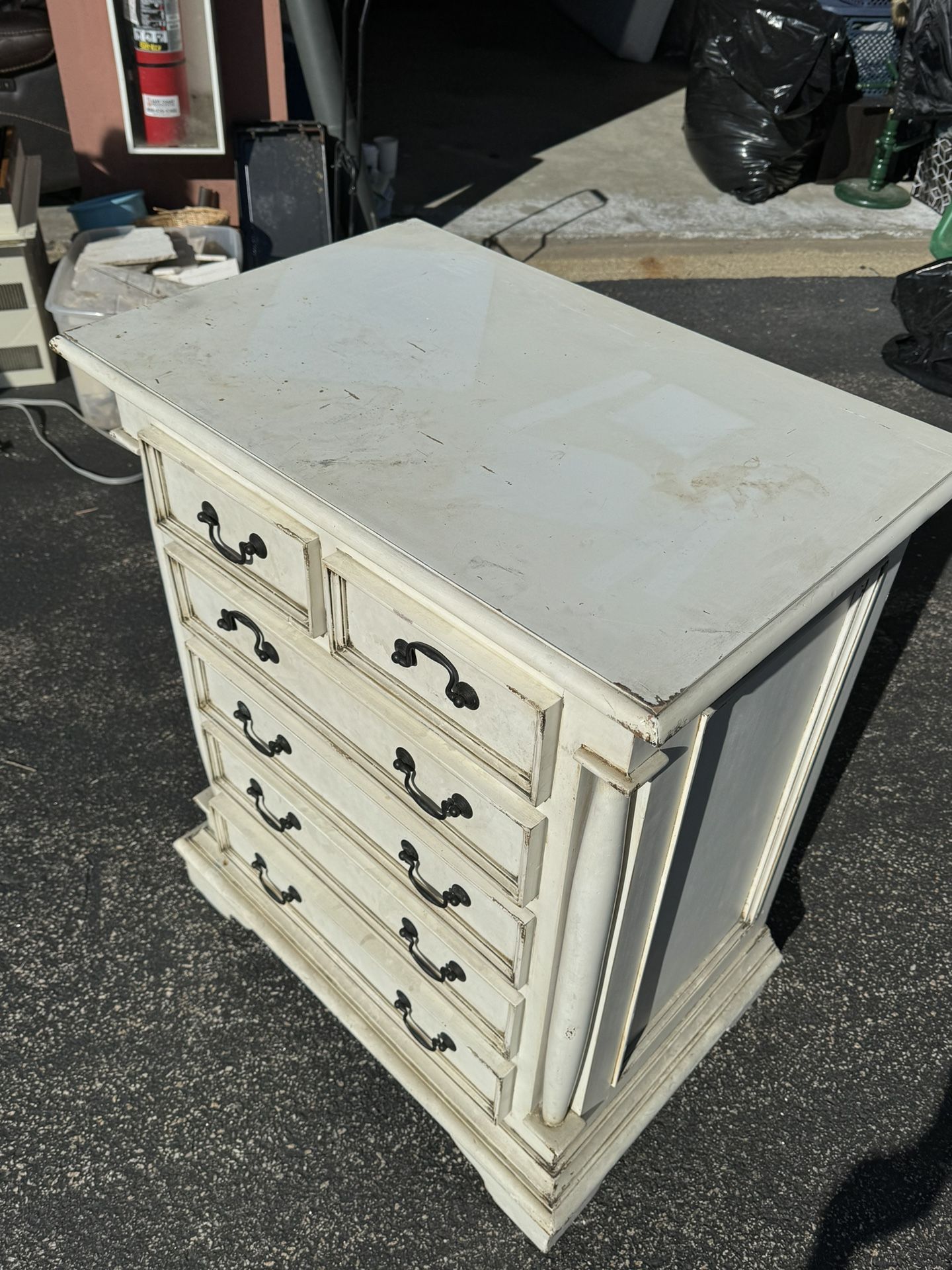 Tall, ivory coloured chest of 6 drawers. Lovely handles and detail throughout.