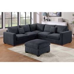 Black corduroy sectional sofa with ottoman