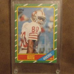 Jerry Rice rookie card, rare Michael Jordan rookie baseball card, and Bo Jackson card.