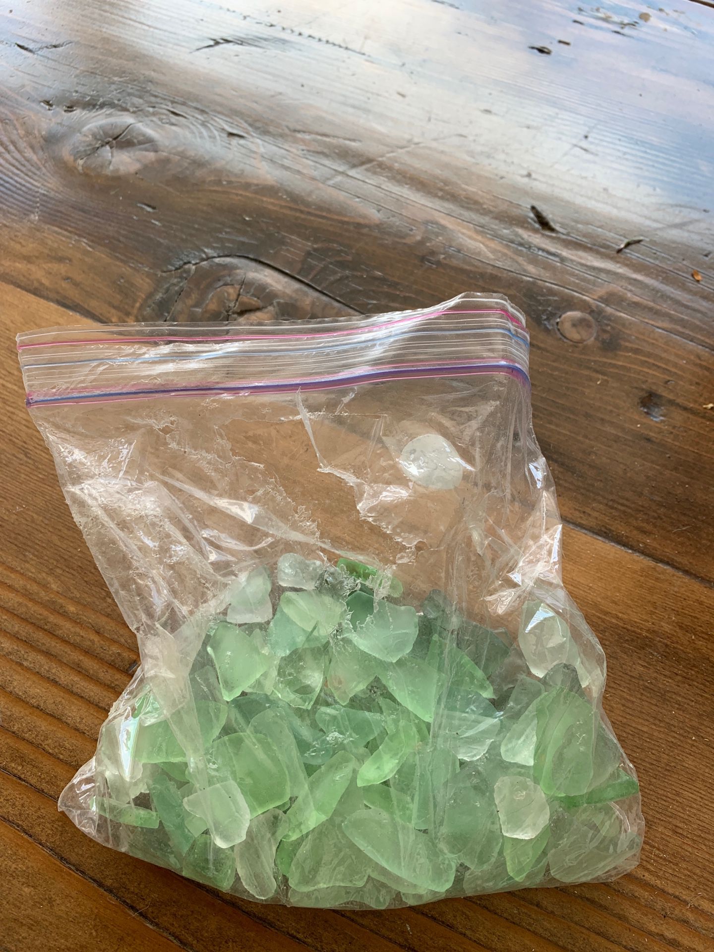 Bag of green glass rocks