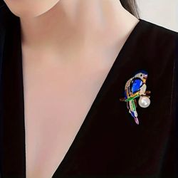 Tropical Paradise Perched: Luxurious Multi-Color Parrot Brooch with Pearl Accent 