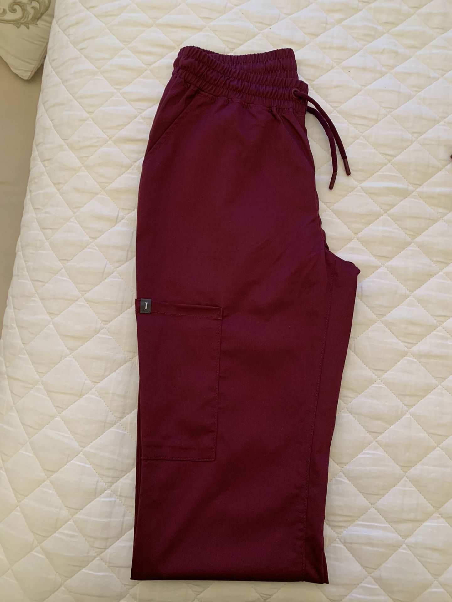 Wine colored scrub set from Jaanuu
