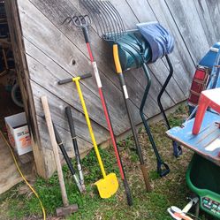 Rake shovel sledge hammer yard tools