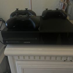 Xbox one, emerge, gaming chair, and three controllers