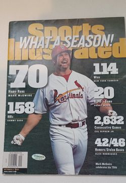 1998 SPORTS ILLUSTRATED AUTOGRAPHED BY MARK MAGUIRE  COMES WITH COA