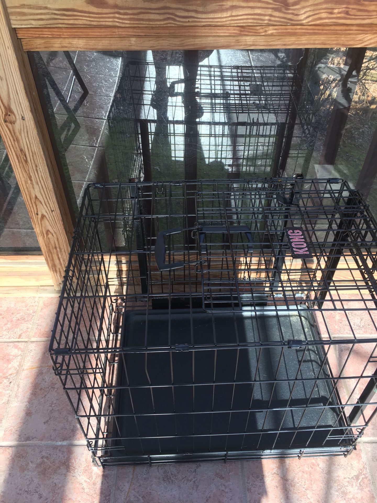 Kong dog cage 1 ft 9 inches tall, 1 ft 7 inches wide with divider piece