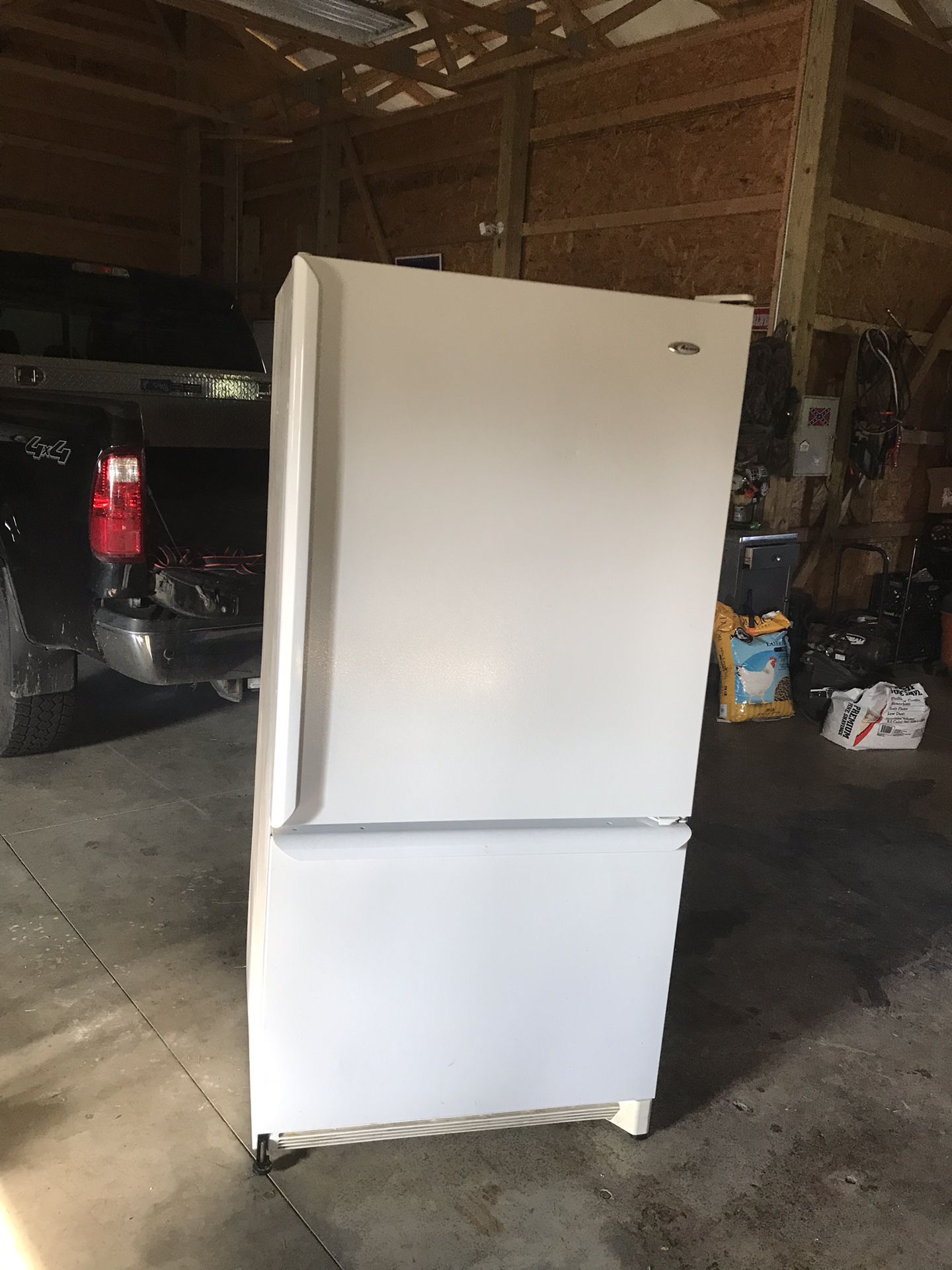 2 year old white over/under Amana refrigerator 32 inches wide by 30.5inches deep by 68 inches tall, works great no issues