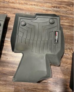 Mazda floormats weathertech.  Brand new. Black/gray