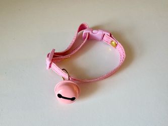 Pink pet collar with a bell