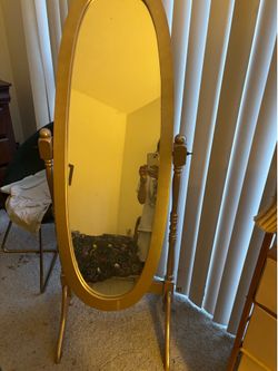 Beautiful full size oval mirror for apartment