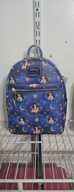 Loungefly mini backpack features an all-over print of characters and symbols from Disney's Aladdin