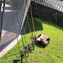 Seven (7) Fishing Rods & Reels plus a tackle Box full of Lures,Hooks,ect