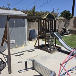 Wooden Kids Play Structure With Swings And Slide