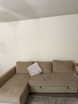 Sofa futon bed with storage compartment