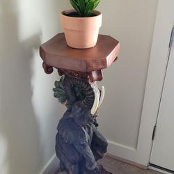 Elephant plant holder sculpture