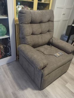 Brand new Mcombo power lift recliner. Have 2
