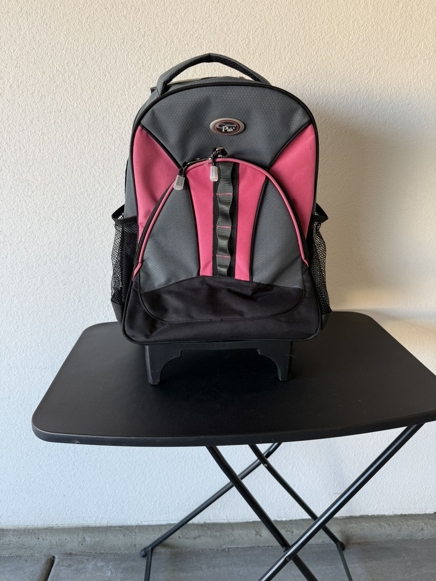 Roller Pink and Black Backpack